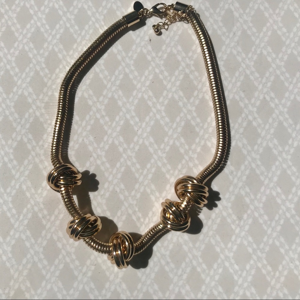 Charming Charlie Gold knot Necklace